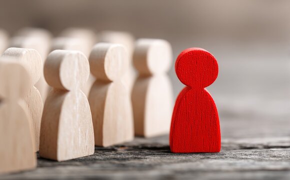 Business hiring and recruitment selection. Human Resource Management.Red manager icon staff employee icon which print screen on wooden people, Choice of employee leader from the crowd.. High quality