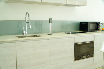 interior of modern kitchen with sink and faucet, nobody
