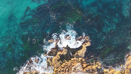 Waves hitting the ocean