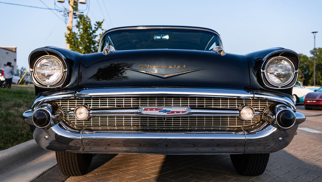 Park Ridge, Illinois, USA - August 22, 2024: Black car of Chevrolet Bel Air . 1957 Chevy Bel Air. Black car parked outdoor at auto show, front view. Chevrolet Bel Air retro car.