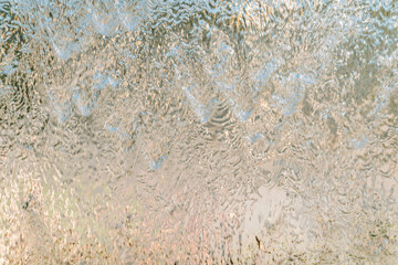Aqua background. Product space next to clean water streams and water splashes and drops.