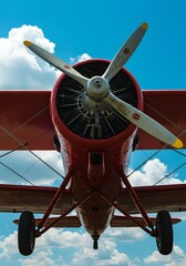 Classic Red Biplane: A Majestic View from Below