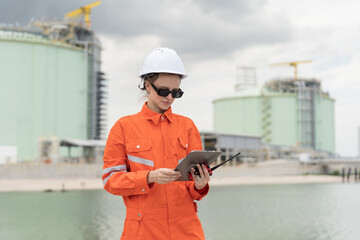 Petroleum Refinery. Natural gas separation plant. Petrochemical engineer inspecting, maintain, repair gas lines, valves and mechanisms deliver natural gas in industries factory refine crude oil