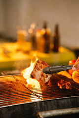 Friends and family enjoy a summer barbecue outdoors, grilling meat and vegetables, laughing, drinking, and celebrating together in the backyard.