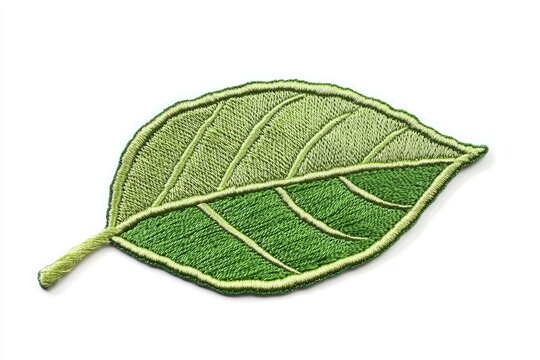 Embroidered leaf patch, vibrant green hues.  Detailed vein patterns and gradients create a realistic leaf