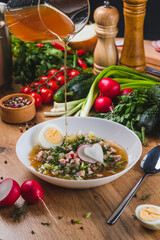 Kvass okroshka with radishes and herbs