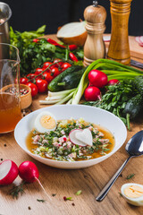 Kvass okroshka with radishes and herbs