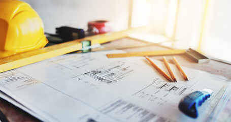 Architecture, blueprint and drawing equipment on table for building renovation, design illustration...