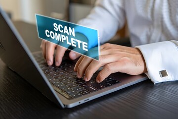 Scan Complete Notification on Business Laptop Screen