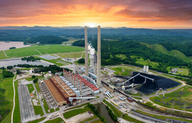 Coal-fired power plant producing electricity. Fossil fuel usage for energy production