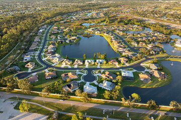 Rich neighborhood with expensive residential homes in southwest Florida. Wealthy suburban area