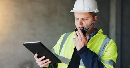 Building, radio and tablet with construction worker man on site for civil engineering or development. App, communication and planning with developer person on worksite for project management