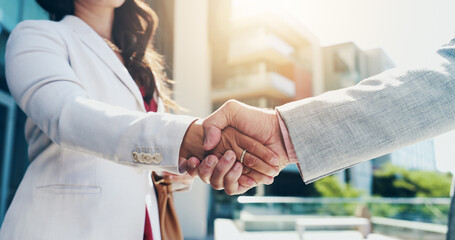 Business people, city and handshake with partnership for B2B deal, agreement or meeting. Closeup,...