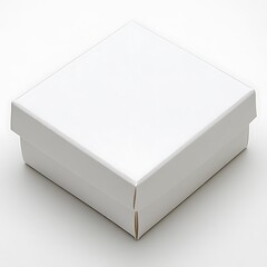 Fototapeta premium An overhead view shows a closed white square box with lid
