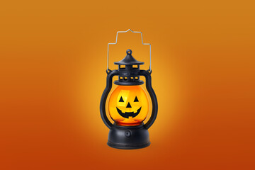 Halloween pumpkin lamp on orange background close up minimal
