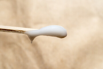 Face cream on a wooden stick