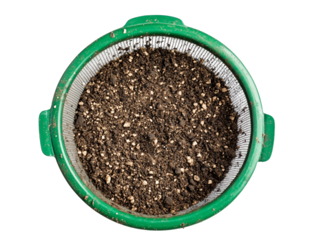 Soil in a green colander