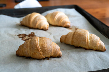Homemade croissant with cherry jam. Dessert. Food. Pastry