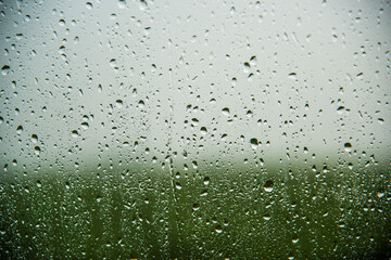 Water drops background, Rain drops on car window.