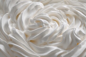 Obraz premium Swirls of creamy white whipped topping texture.