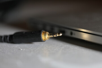 Plug the USB cable into the USB port on the back of the computer.