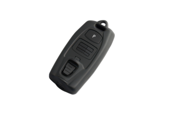 Compact, dark gray remote control with buttons and a keyring