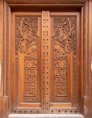 Intricate patterns carved into Moroccan wooden furniture and doors display the artistry and traditional woodworking skills.