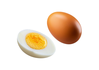 Single whole boiled egg with halved egg flying isolated on transparent or white background