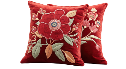 Red velvet cushions featuring embroidered floral designs