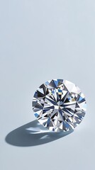 Close-up of a sparkling round brilliant-cut diamond gemstone casting a soft shadow on a clean light background, symbolizing luxury and elegance

