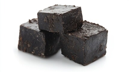Dark, square-shaped, rich-looking confections
