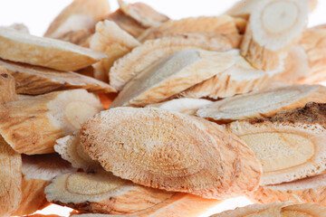Chinese herbal medicine astragalus membranaceus on a white background