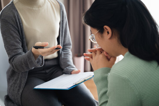 Psychologist doctor examine and listen and talking to patient with depression, anxiety