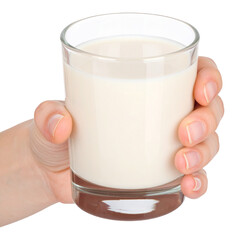 Glass of milk held in hand against dark background showing beverage and dairy product with focus on nutrition