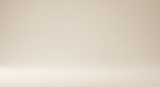Empty beige studio background with soft lighting creates a smooth clean aesthetic