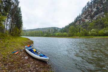 Experience a breathtaking scenic kayak adventure as you glide along a tranquil riverbank that is...