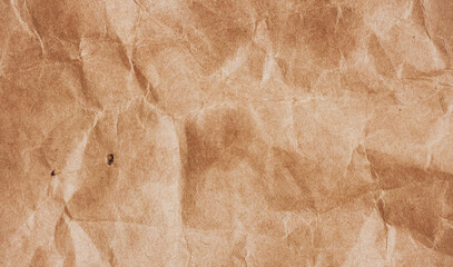 Brown paper bag texture as background, top view
