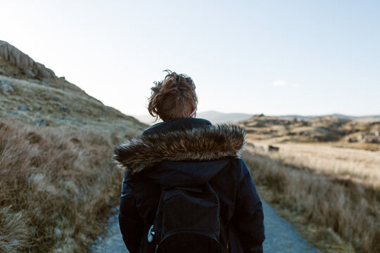 Man hiking along Dow Crag Ridge in Cumbria Lake District