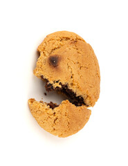 Crumbled chocolate cookies with chocolate filling isolated, brown round biscuits pieces