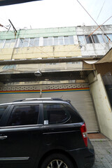 A traditional market building in South Korea, featuring a lively atmosphere and showcasing local culture and products.