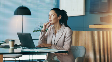 Office, businesswoman and thinking with laptop for research, investment information or accountant....