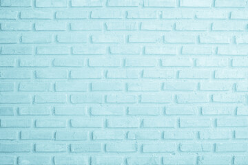 Obraz premium Brick wall painted with pale blue paint pastel calm tone texture background. Brickwork and stonework flooring interior rock old pattern clean concrete grid uneven bricks design stack backdrop.