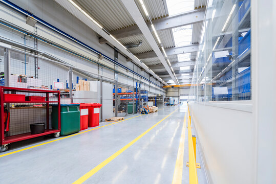 Interior of a modern production hall with industrial equipment and nobody present