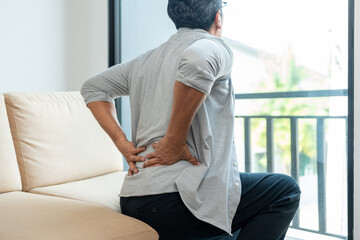 Old man senior has problem with structural posture He had back and neck pain. Mature Massaged his...