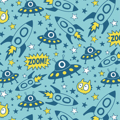 Obraz premium Cartoon space pattern with rockets and UFOs on blue background