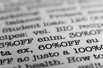 60 percent off. Text printed on a page. A piece of paper with a phrase. Marketing.