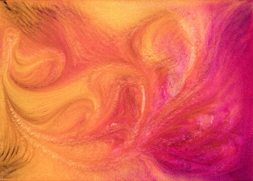 Colorful swirls of glitter ink blend in striking patterns