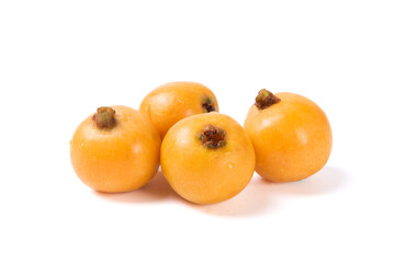 Ripe loquats fruit isolated on white background.