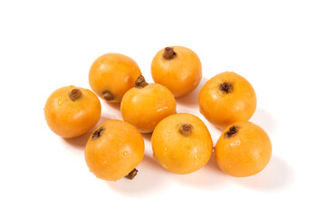 Ripe loquats fruit isolated on white background.