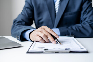 Business man employer holding resume hiring recruit looking cv resume to hire candidates, analyzing information before job interview. Recruitment concepts